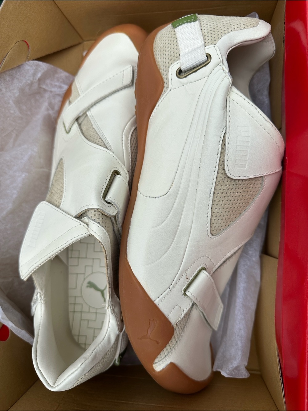 Puma Women's White Leather Slip-On Sneakers with Gum Outsole